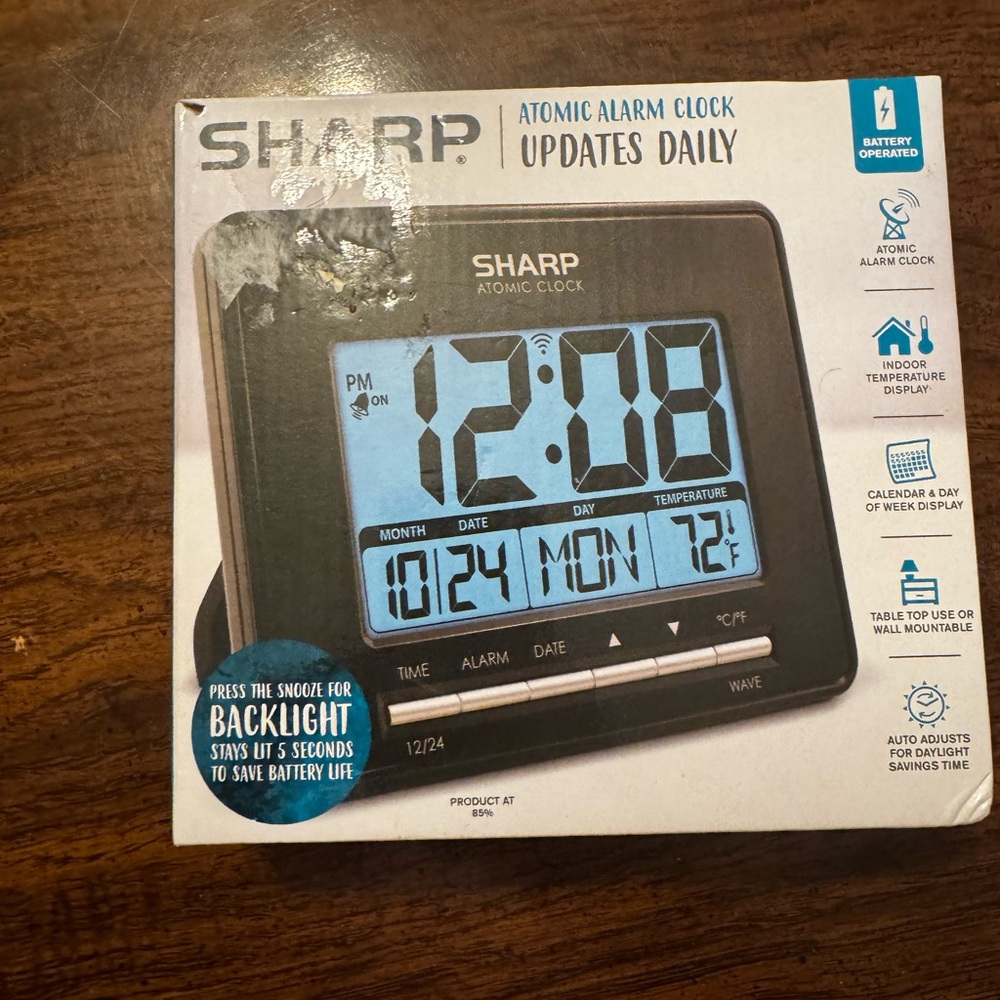 Sharper Image Black and Blue Atomic Clock Stationery